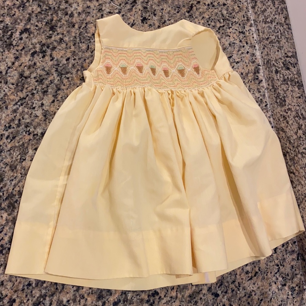 Yellow dress with ice cream cones at the top